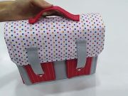 Álbum con maletita en tela.